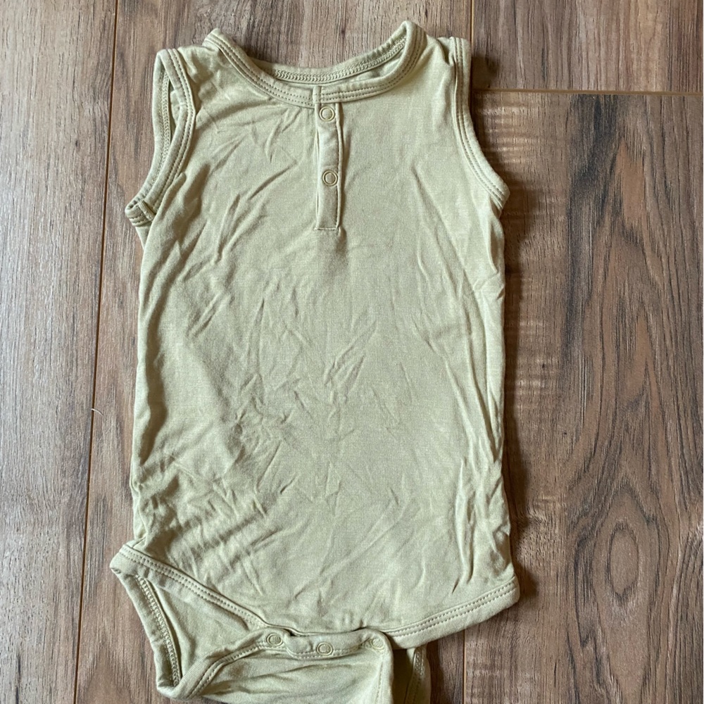 Colored organics (NB) and kyte baby (3-6) onesies. Gender neutral tan.